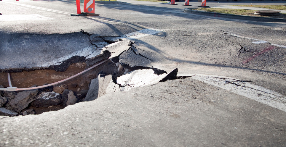 sinkhole causes accident and injuries